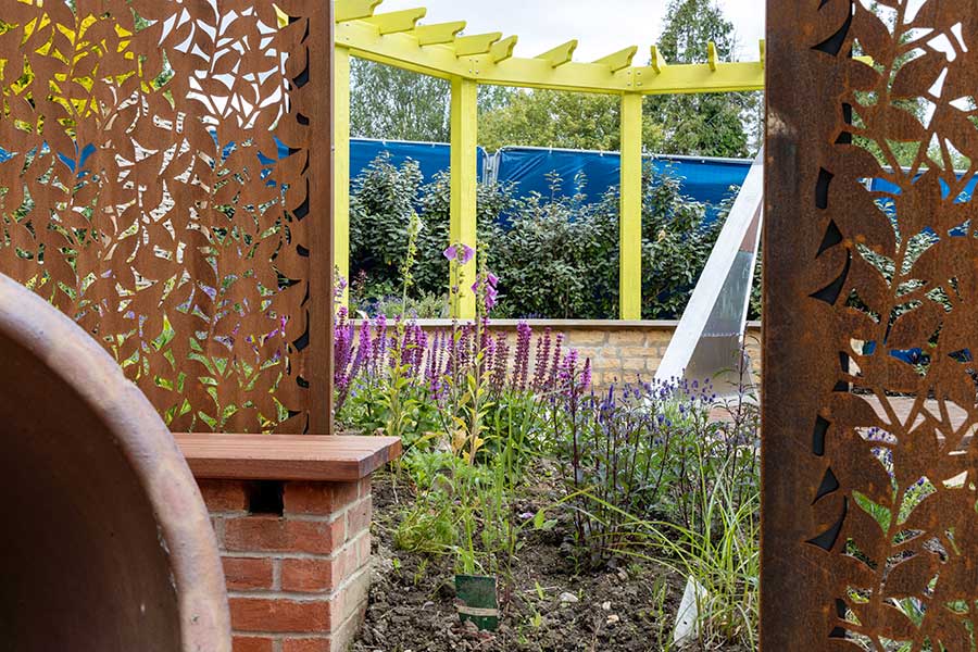 Laser cut metal screens installed in the Feature Garden at Oxford Garden Centre